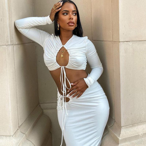 Sexy hollow out long sleeve top slim hip Skirt Set